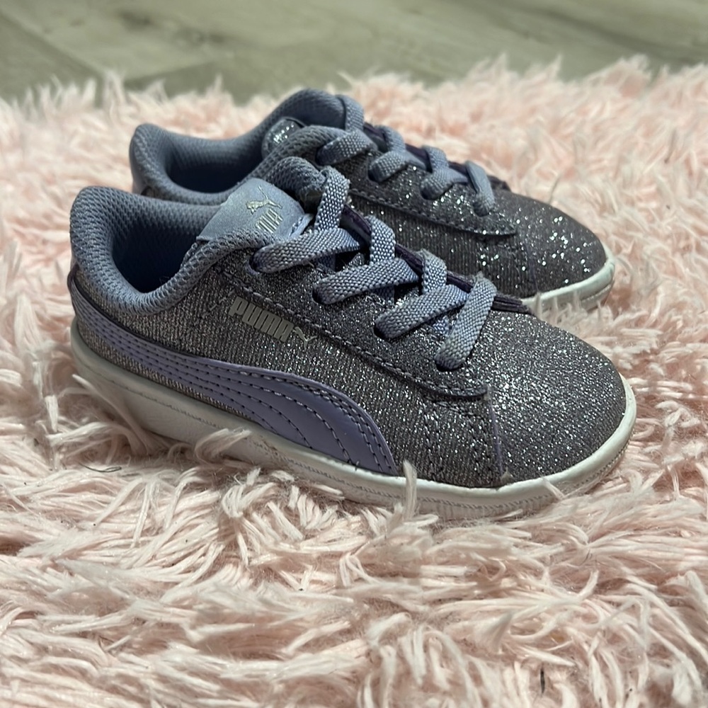 Gently worn toddler purple sparkle PUMA sneakers, size 6C